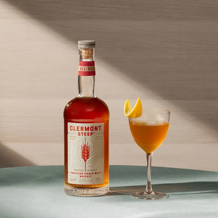 Clermont Whiskey bottle and Single Malt Sidecar cocktail